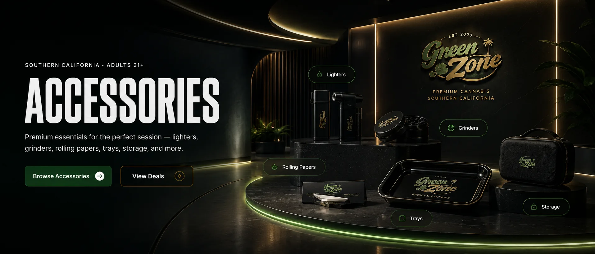 Green Zone accessories on a lit black display — torch lighters, a grinder, rolling papers, a rolling tray and a zip storage case